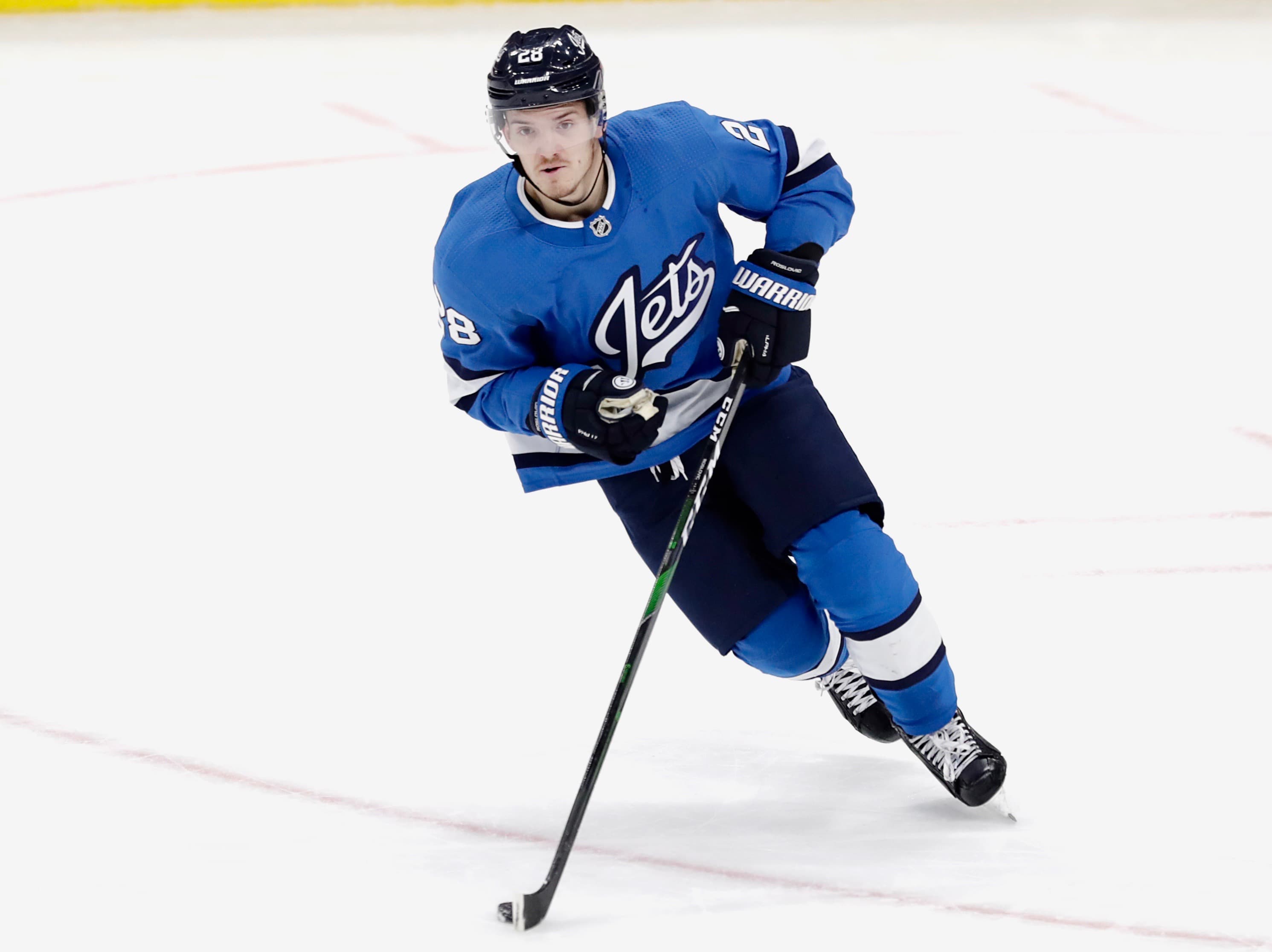 Roslovic, Hellebuyck Lead Jets Past Blues