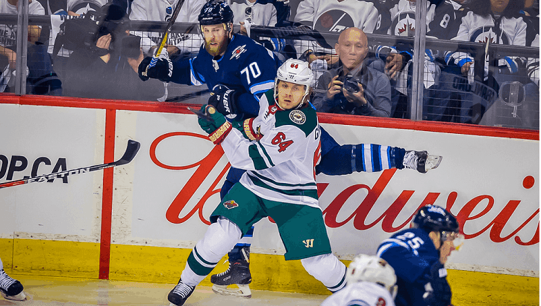 Jets Edge Wild to Get First Playoff Win